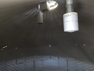 Radar level sensor VEGAPULS C 23 measures level in a grain silo.