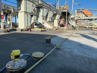 Radar level sensors are installed on multiple grain silos using a flange process connection.