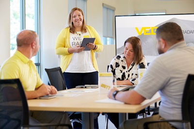 Abby Timon leads a meeting.