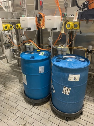 Each CIP station uses chemicals in 55-gallon drums on rollers for easy portability.