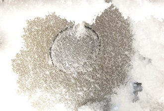 Underside of a radar level sensor with frost buildup
