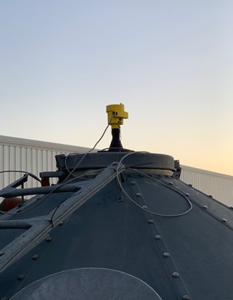 The VEGAPULS 69 radar sensor provides accurate continuous level measurements from the top of the silo holding plastic pellets.
