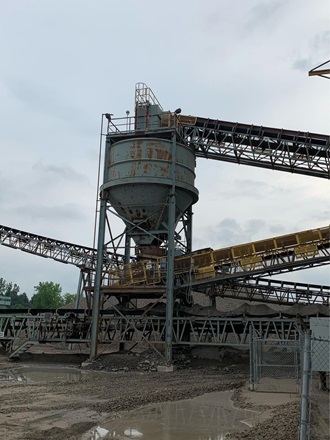 A stone bin at a rock quarry helps to ensure a steady flow of aggregates