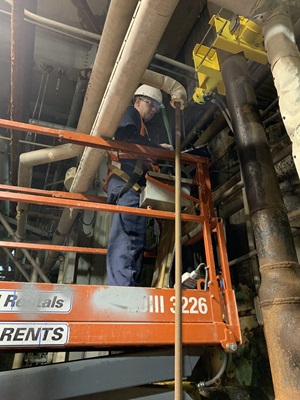 A VEGA Field Service Technician installs a MiniTrac 31 onto a pipe where the plant required a crucial density measurement.