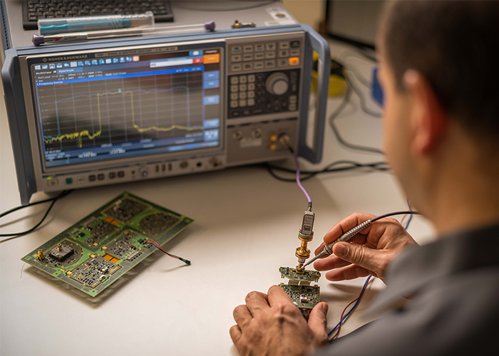 VEGA employees testing a sensor